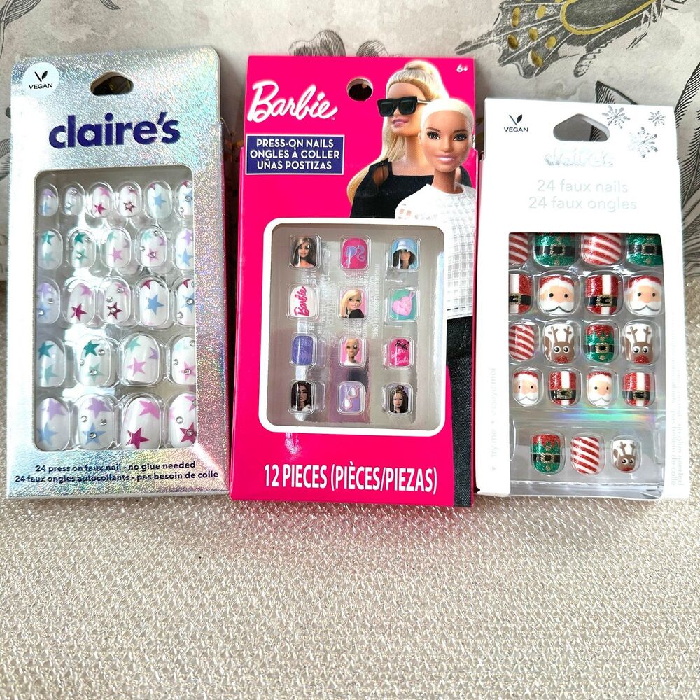 Three pack girls press on nails - 2 Claire’s holiday sets and 1 Barbie set
